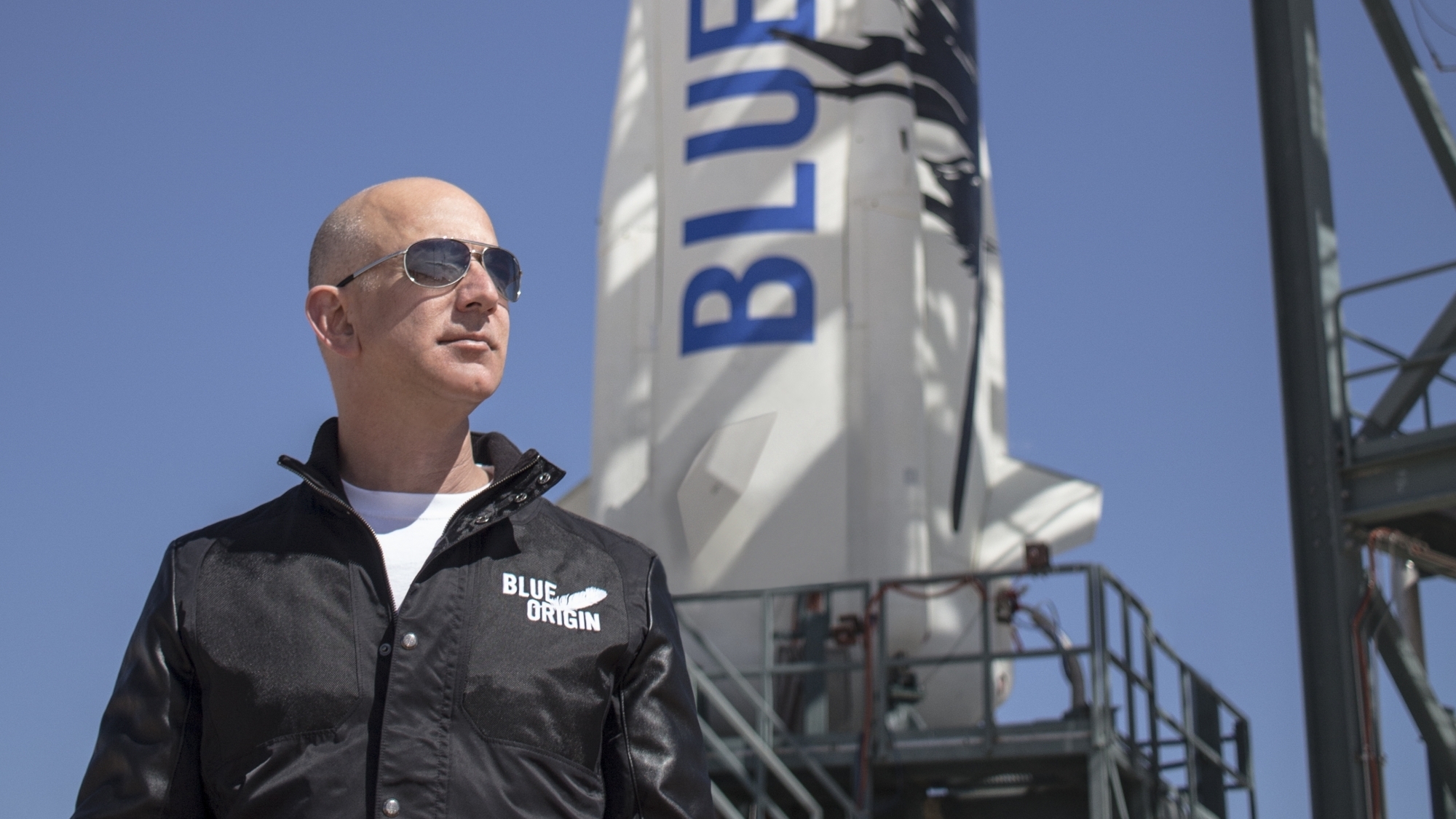 Bezos heats up space race against Musk, aims Blue Origin commercial flight next year