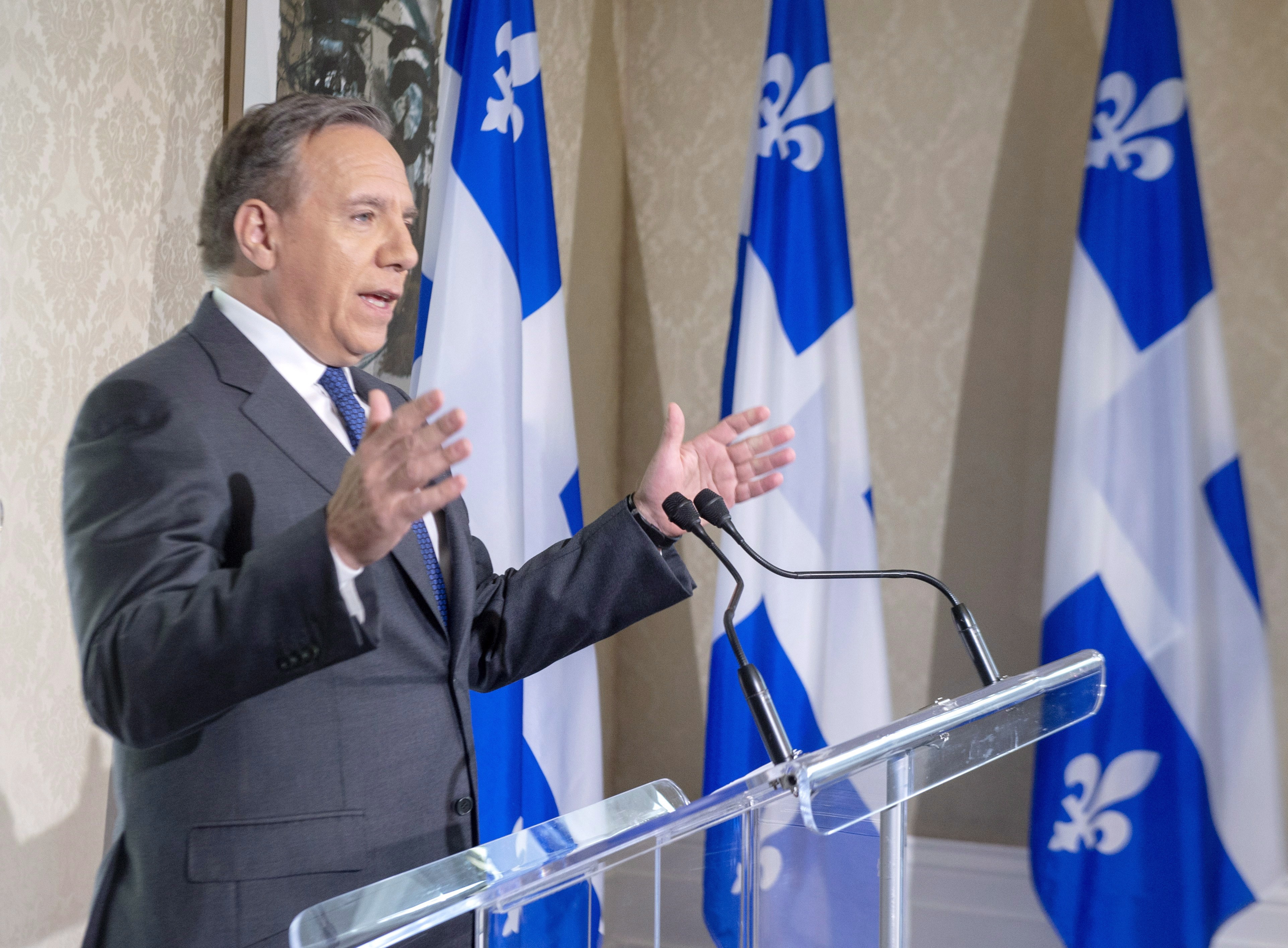 Quebec's Premier designate remains firm on controversial promises after historic win
