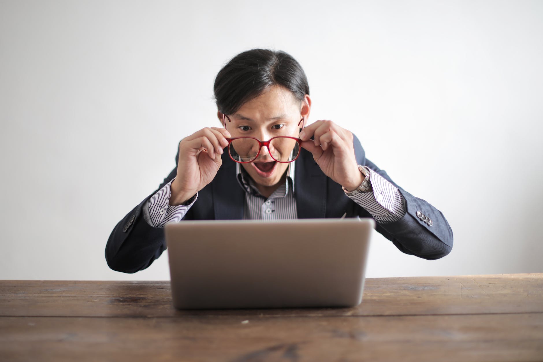 Photo of man shocked by news story by Andrea Piacquadio on Pexels.com